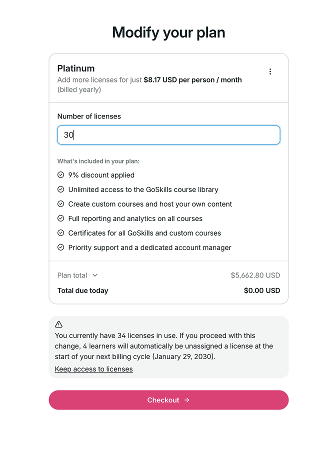 Modify your plan page warning that reducing licenses below those in use will unassign learners.